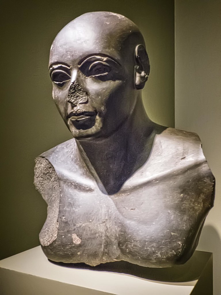 Statue of a Man possibly a cleric or high official Egypt Late Ptolemaic Period 150-27 BCE Basalt